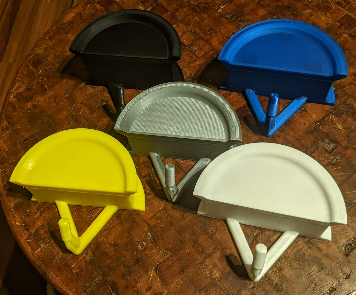 5 different colors of wall mount bridle holders
