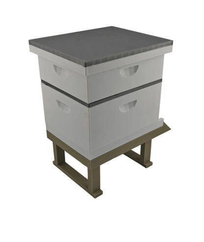 Miniature Beekeeping hive with two boxes on a white background back iso