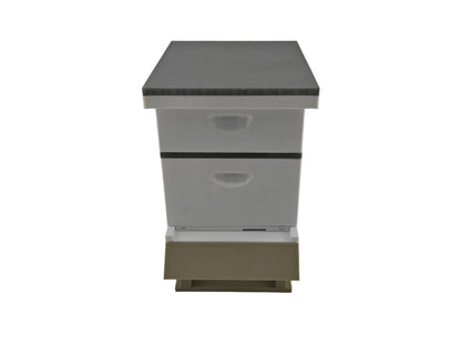 Miniature Beekeeping hive with two boxes on a white background front