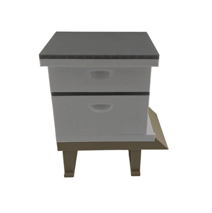 Miniature Beekeeping hive with two boxes on a white background side