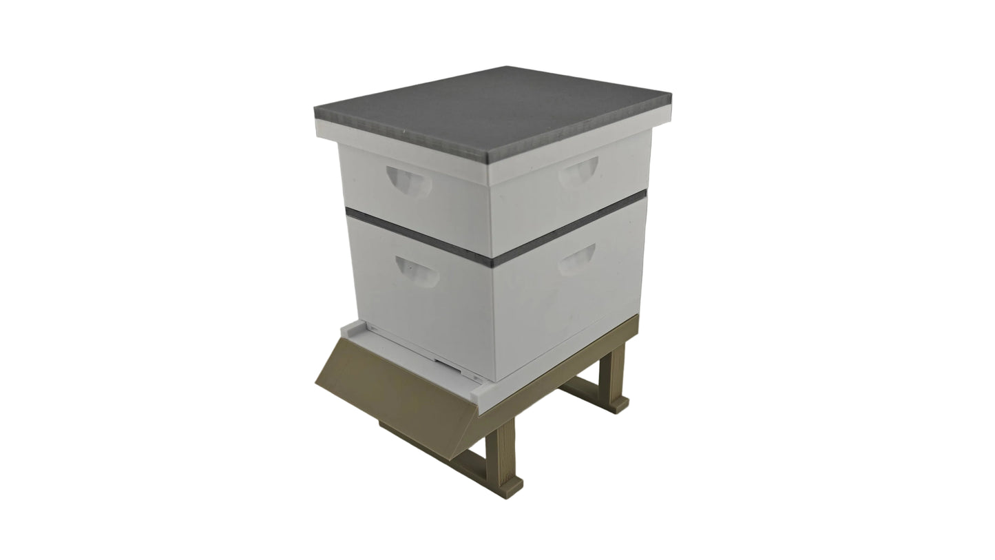 Miniature Beekeeping hive with two boxes on a white background